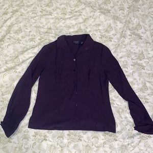 With a video attached to show the fit, a deep purple, super soft luxury blouse.